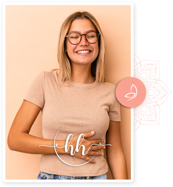 Happy young lady wearing glasses, softly smiling and holding her stomach